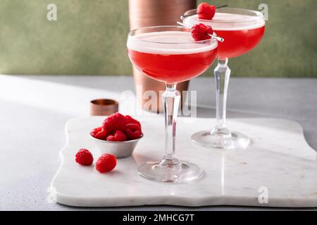 Raspberry martini cocktail with vodka, juice and raspberry liqueur Stock Photo