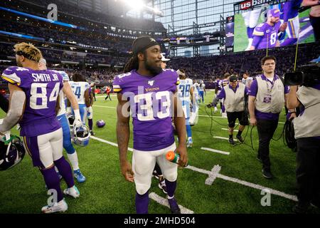 Minnesota Vikings running back Dalvin Cook walks on the field