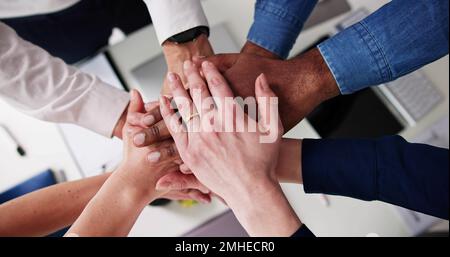 Directly Above Shot Of Medical Team Stacking Hands Together At Hospital Stock Photo