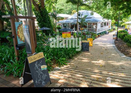Cafe surrounded by trees in main street of Maleny, Sunshine Coast Hinterland, Queensland Australia Stock Photo
