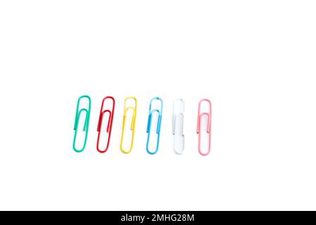 Paper clip or office bind clip, stationery, realistic object on isolated white background. Office leadership and team work concept. Stock Photo
