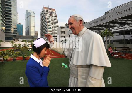 A life size statue of Pope Francis is displayed at the ground of Saint Louis  Hospital in Bangkok in preparation for Pope Francis visit in Thailand and  Japan on November 20-26. The
