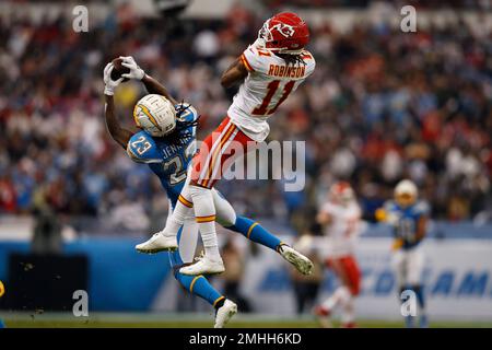 Los Angeles Chargers strong safety Rayshawn Jenkins (23) intercepts a pass  intended for Kansas City Chiefs wide receiver Demarcus Robinson (11) during  the first half of an NFL football game Monday, Nov.