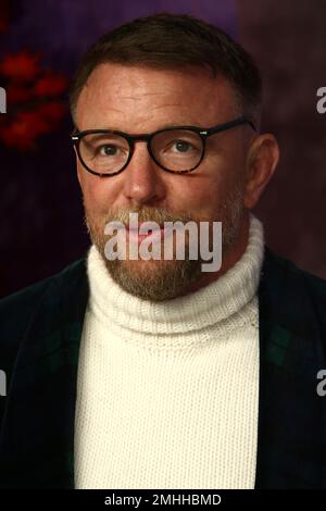 Guy Ritchie poses for photographers upon arrival at the opening gala ...