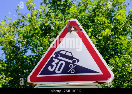 red and white Traffic Sign Steep incline 30% 30 percent gradient road Stock Photo