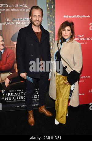 Jesper Vesterstroem, left, and Jennifer Esposito attend a special