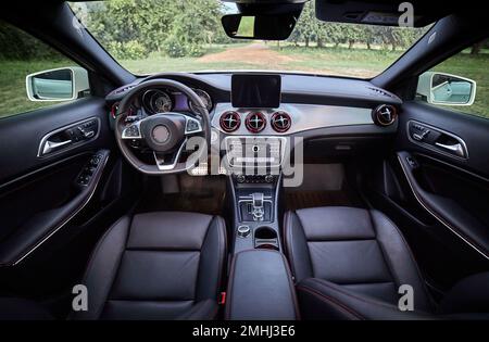 Inside moden car background, luxury car interior elements wallpaper. Black leather car interior Stock Photo