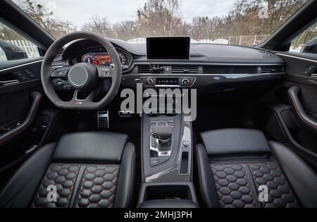 Inside moden car background, luxury car interior elements wallpaper. Black leather car interior Stock Photo