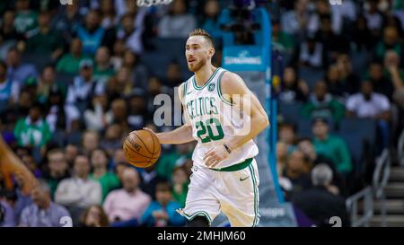 Charlotte Hornets forward Gordon Hayward (20) brings the ball up court  against the Washington Wizards during the first half of an NBA basketball  game in Charlotte, N.C., Wednesday, Nov. 17, 2021. (AP