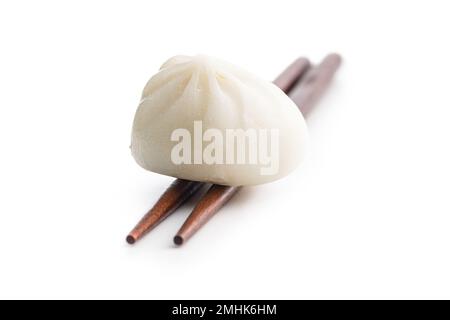 Xiaolongbao, traditional steamed dumplings. Xiao Long Bao buns isolated on the white background. Stock Photo