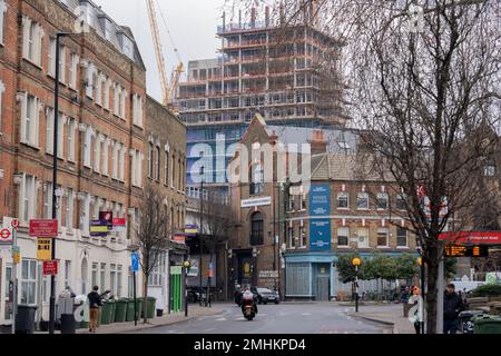 The tall high-rise residential development called Higgs Yard, rises with more storeys above existing local housing at Loughborough Junction in Lambeth, south London, on 24th January 2023, in London, England. Higgs Yard will be a residential-led mixed-use development on the Higgs Industrial Estate in Loughborough Junction, London SE24. 134 new homes and 4,150m2 of commercial floorspace. 50% of the homes will be affordable. Stock Photo