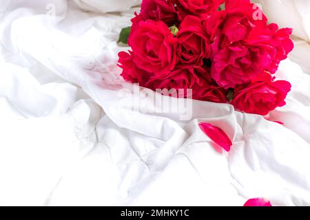 Colorful flower bouquet from red roses isolated on white background. Closeup. Stock Photo