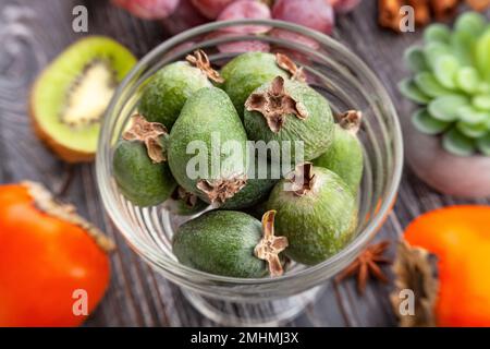 feijoa group on wood background Stock Photo
