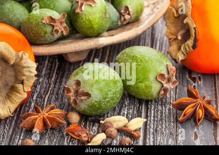feijoa group on wood background Stock Photo