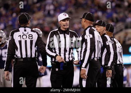 Replay Assistant Roddy Ames, from left, line judge Bart Longson (2), Down  Judge David Oliver, field judge Terry Brown (43), umpire Carl Paganelli  (124), referee Walt Anderson (66), referee Carl Cheffers (51)