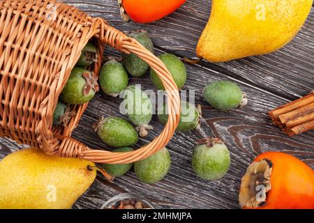 feijoa group on wood background Stock Photo