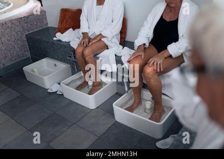 Woman having footbath Stock Photo