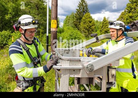 Electricians at work Stock Photo