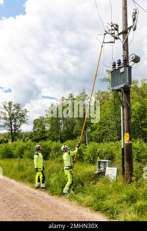 Electricians at work Stock Photo