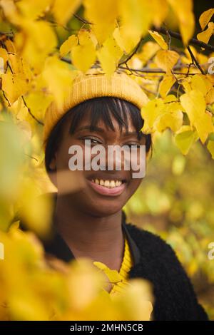 Smiling woman looking at camera Stock Photo