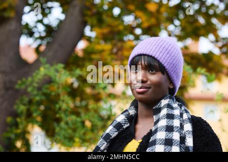 Smiling woman looking away Stock Photo