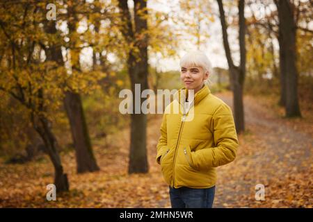 Smiling woman looking away Stock Photo
