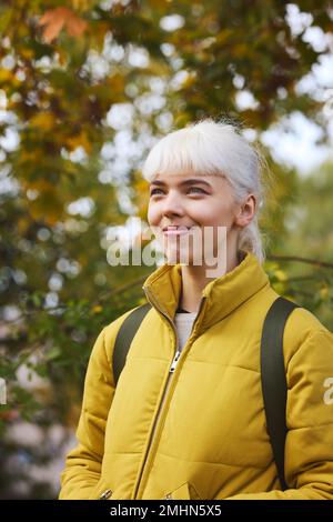 Smiling woman looking away Stock Photo