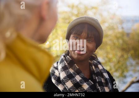 Smiling woman looking away Stock Photo