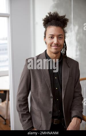 Portrait of young businessman in office Stock Photo
