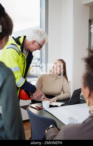 Architects having meeting in office Stock Photo