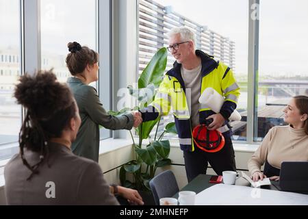 Architects having meeting in office Stock Photo