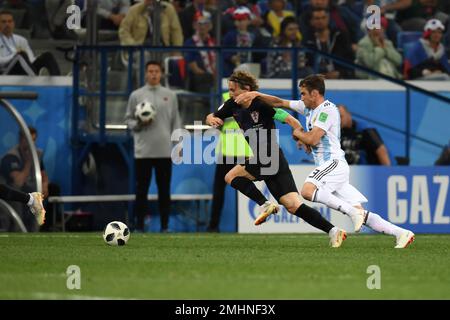 NIZHNIY NOVGOROD, RUSSIA - JUNE 21: Luka Modric of Croatia and Nicolas Tagliafico of Argentina battle for possession, 2018 FIFA World Cup Russia Stock Photo