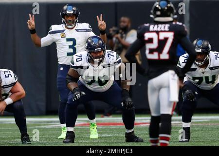 Seattle Seahawks quarterback Russell Wilson (3) calls an audible against  the Atlanta Falcons during the second half of an NFL football game, Sunday,  Oct. 27, 2019, in Atlanta. (AP Photo/John Bazemore Stock