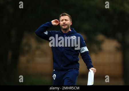 LA Rams Head Coach Sean McVay consults with Todd Gurley during the