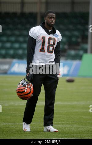 Cincinnati Bengals' wide receiver A. J. Green, 18, who is recovering from  an injury, attends an NFL practice session at the Allianz Park stadium in  north London, Friday, Oct. 25, 2019. The