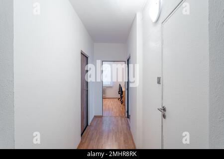 long corridor in a panel apartment Stock Photo
