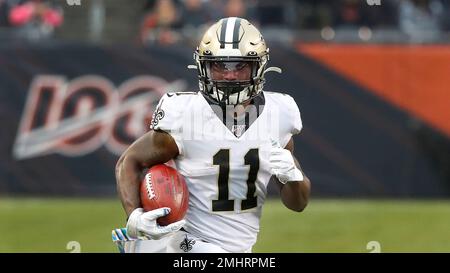 New Orleans Saints' Deonte Harris (11) carries on a punt return as Seattle  Seahawks' Jamar Taylor moves in during the first half of an NFL football  game, Sunday, Sept. 22, 2019, in