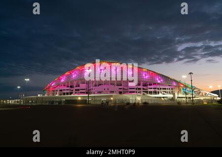 Sochi, Russia - July 18, 2022: Night panoramic view of illuminated Fisht Olympic Stadium. Stock Photo