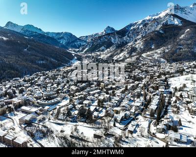 Panoramic view of Bardonecchia village from above, ski resort in the italian western Alps, Piedmont, Italy. Bardonecchia, Italy - January 2023 Stock Photo