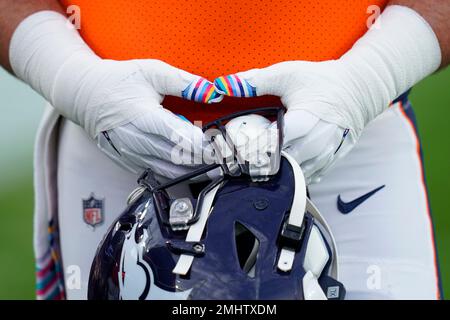 A Crucial Catch logo is seen on a t-shirt worn by Kansas City Chiefs wide  receiver Marcus Kemp before the start of an NFL football game between the  Kansas City Chiefs and