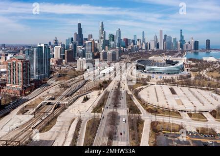 Aerial view of downtown Chicago from south of the loop with Soldier Field, the skyline and Monroe Harbor in the distance. Stock Photo