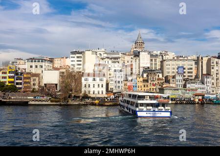Istanbul, Turkey January 22, 2023 Bosphorus crossing view from the Galata Bridge on the coast of Istanbul. The concept of tourism and travel. Stock Photo