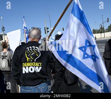 Jerusalem, Israel. 27th Jan, 2023. Israelis demonstrate against Prime Minister Benjamin Netanyahu's judicial reform and the threat to democracy outside the Supreme Court in Jerusalem, on Friday, January 27, 2023. The anti-government protesters carry Israeli flags and chant 'Democracy Now.' Photo by Debbie Hill/ Credit: UPI/Alamy Live News