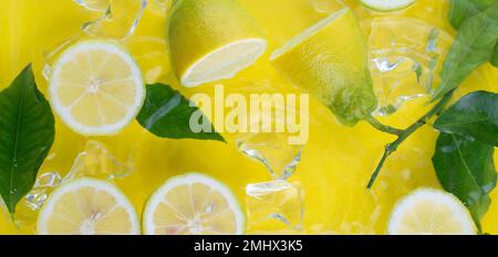 fresh sliced lemons in water for refreshing drink Stock Photo