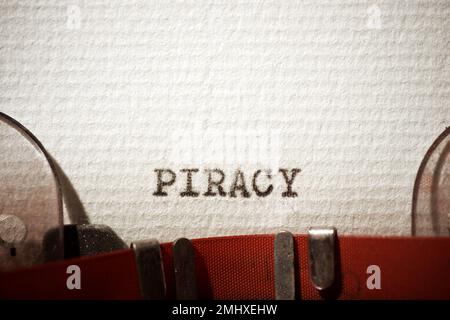 Piracy word written with a typewriter. Stock Photo