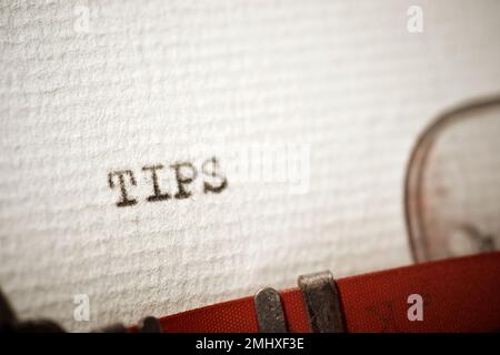 Tips word written with a typewriter. Stock Photo