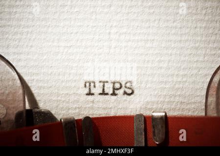 Tips word written with a typewriter. Stock Photo