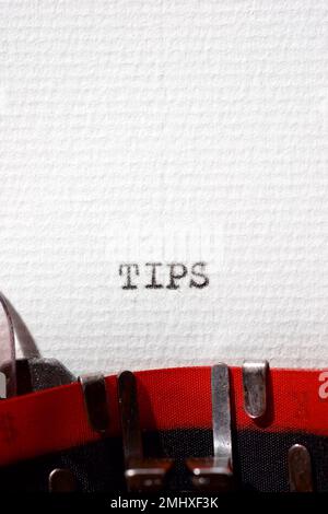 Tips word written with a typewriter. Stock Photo