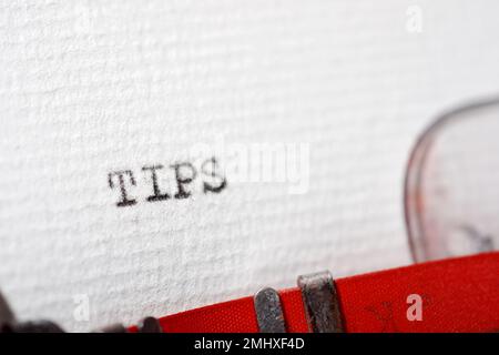 Tips word written with a typewriter. Stock Photo