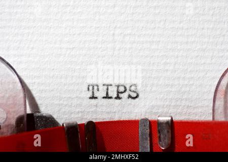 Tips word written with a typewriter. Stock Photo